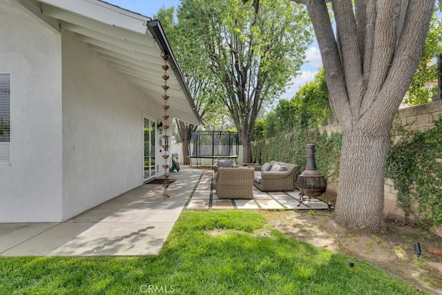 22724 Califa St, Woodland Hills, CA 91367 - view of yard with a trampoline, a patio area, and outdoor lounge area