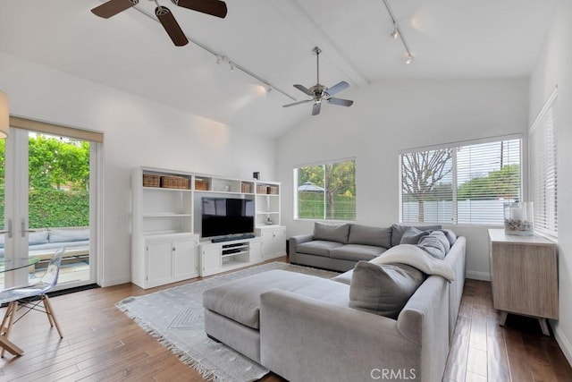 22724 Califa St, Woodland Hills, CA 91367 - living room featuring track lighting, ceiling fan, and healthy amount of natural light
