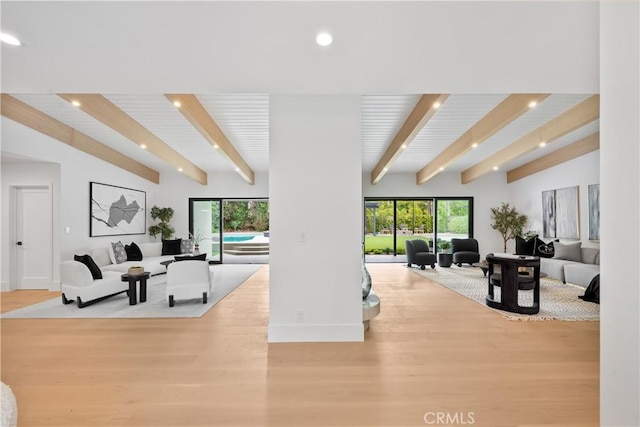 living room with beamed ceiling, wood finished floors, baseboards, and recessed lighting