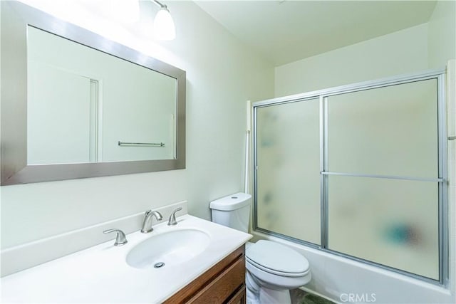 65 Rambling Ln, Aliso Viejo, CA 92656 - bathroom with toilet, combined bath / shower with glass door, and vanity