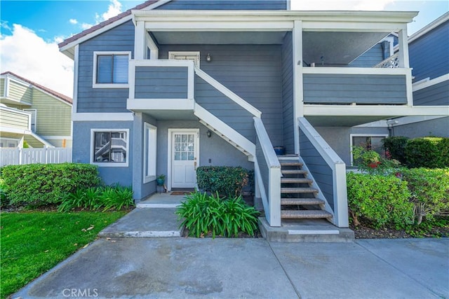 65 Rambling Ln, Aliso Viejo, CA 92656 - multi unit property featuring fence, stairs, and stucco siding
