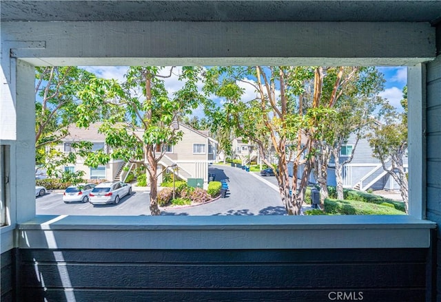 65 Rambling Ln, Aliso Viejo, CA 92656 - exterior details featuring a parking lot and a residential view
