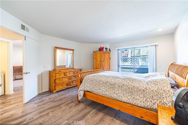 65 Rambling Ln, Aliso Viejo, CA 92656 - bedroom with visible vents and light wood-style flooring