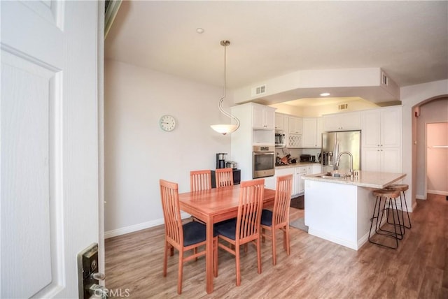803 Maplewood, Irvine, CA 92618 - dining space featuring light wood-type flooring, visible vents, and baseboards