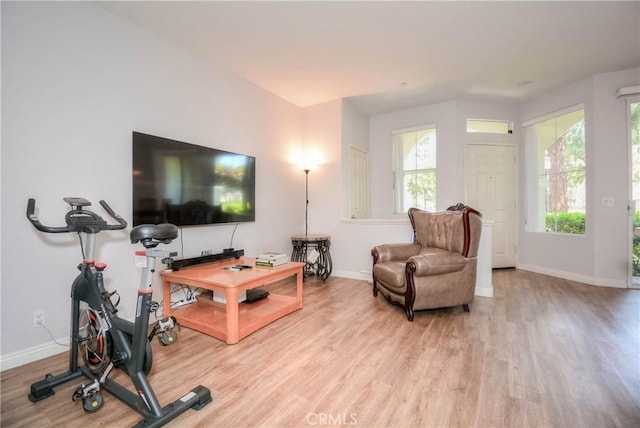 803 Maplewood, Irvine, CA 92618 - living room featuring baseboards and wood finished floors