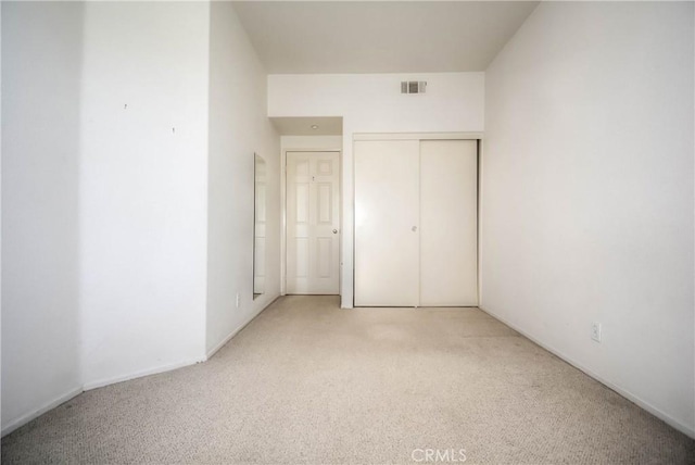 803 Maplewood, Irvine, CA 92618 - unfurnished bedroom featuring baseboards, light carpet, visible vents, and a closet