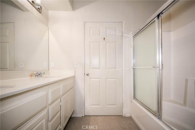 803 Maplewood, Irvine, CA 92618 - full bath with combined bath / shower with glass door, baseboards, a sink, and double vanity