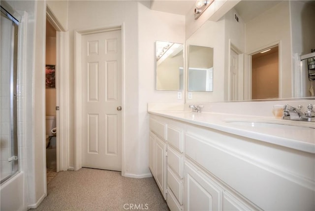 803 Maplewood, Irvine, CA 92618 - full bathroom featuring baseboards, a sink, a shower with shower door, and double vanity