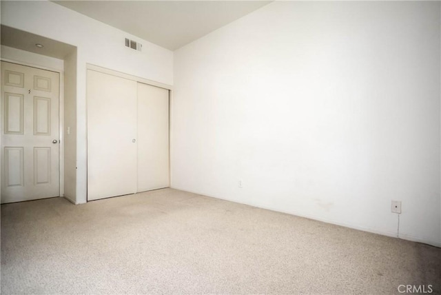 803 Maplewood, Irvine, CA 92618 - unfurnished bedroom with a closet, visible vents, and light carpet