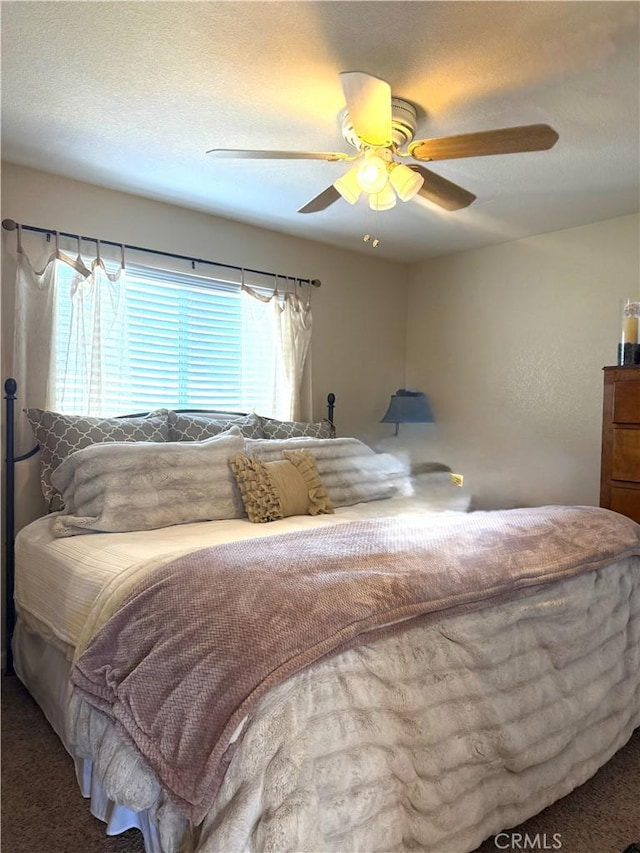 5170 Coronado St, Chowchilla, CA 93610 - carpeted bedroom featuring ceiling fan and multiple windows