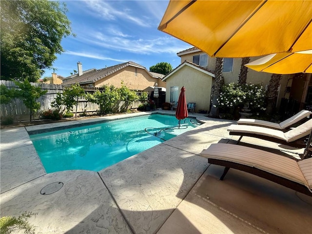 5170 Coronado St, Chowchilla, CA 93610 - view of swimming pool with a fenced backyard, a fenced in pool, and a patio area