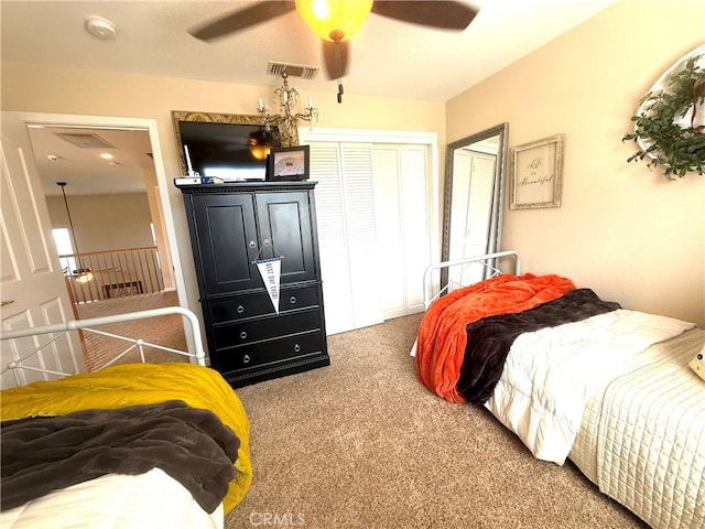 5170 Coronado St, Chowchilla, CA 93610 - carpeted bedroom with visible vents, ceiling fan, and a closet