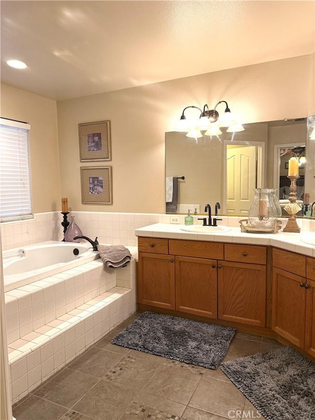 5170 Coronado St, Chowchilla, CA 93610 - bathroom featuring tile patterned floors, a bath, and vanity