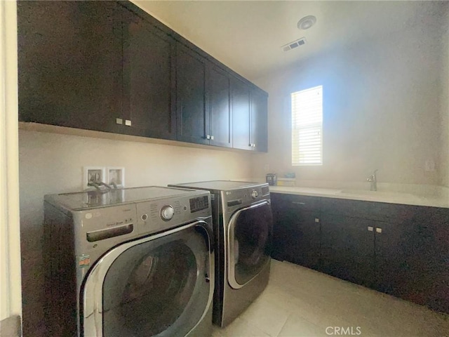 99 Swift, Irvine, CA 92618 - laundry area featuring cabinet space and washer and dryer