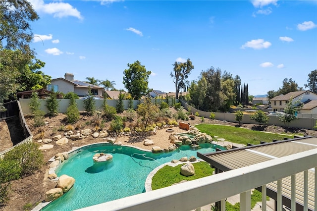 view of property's community with a fenced backyard
