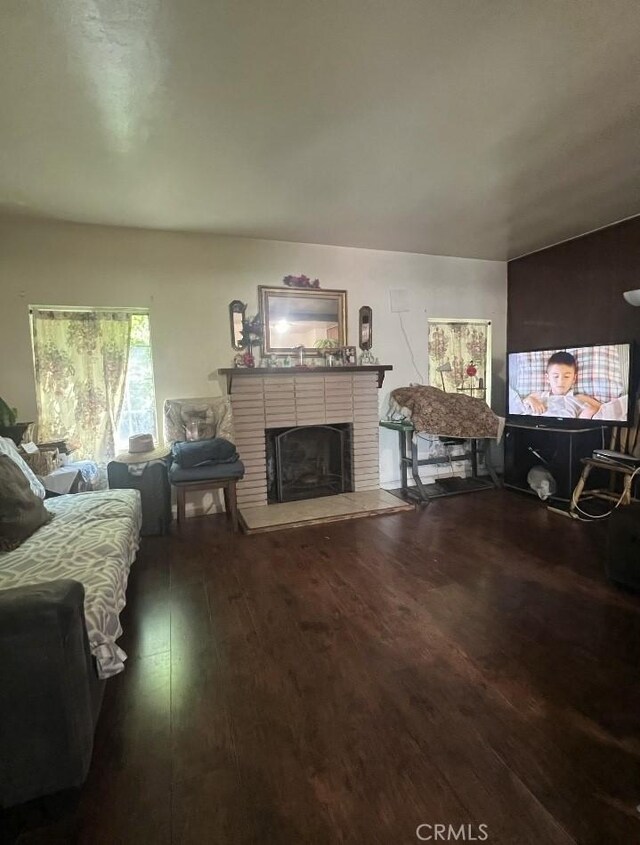 7935 Cleon Ave, Sun Valley, CA 91352 - living room with a fireplace and hardwood / wood-style flooring