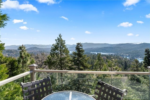 exterior space featuring a forest view