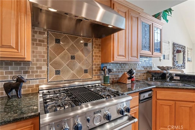 432 Grizzly Rd, Lake Arrowhead, CA 92352 - kitchen with under cabinet range hood, stove, tasteful backsplash, and dark stone counters
