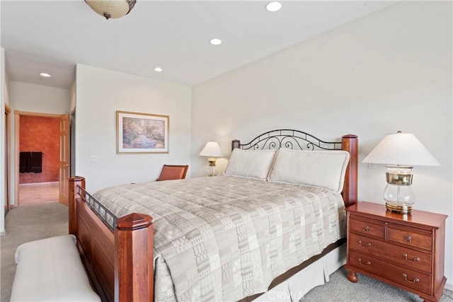 bedroom featuring recessed lighting and light colored carpet