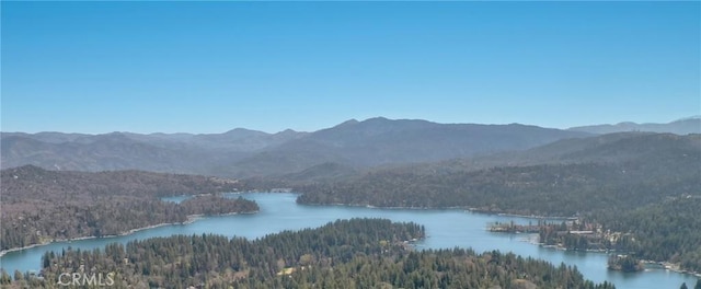 mountain view featuring a water view and a forest view