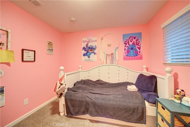bedroom featuring visible vents, carpet flooring, and baseboards