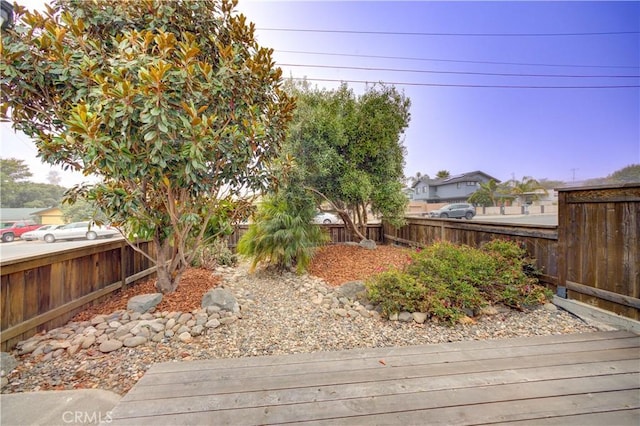 234 N 12th St, Grover Beach, CA 93433 - fenced backyard with a wooden deck