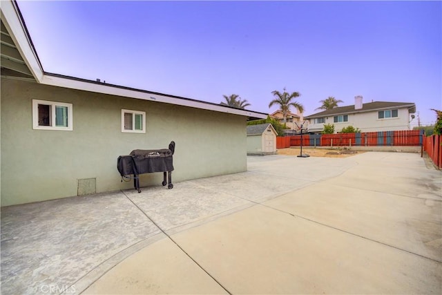 234 N 12th St, Grover Beach, CA 93433 - fenced backyard with a storage unit and a patio area