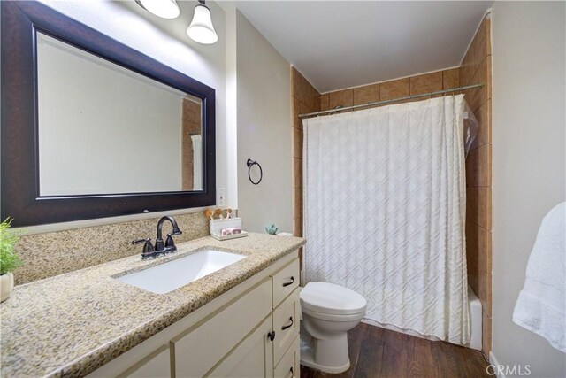 234 N 12th St, Grover Beach, CA 93433 - full bathroom with vanity, wood finished floors, and shower / bath combo