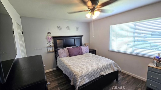 1954 Elizabeth Ave, Corning, CA 96021 - bedroom featuring baseboards, a ceiling fan, and dark wood-style floors