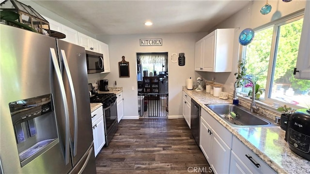 1954 Elizabeth Ave, Corning, CA 96021 - kitchen featuring stainless steel appliances, a sink, recessed lighting, white cabinetry, and dark wood-type flooring
