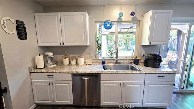1954 Elizabeth Ave, Corning, CA 96021 - kitchen featuring white cabinets, stainless steel dishwasher, and a sink