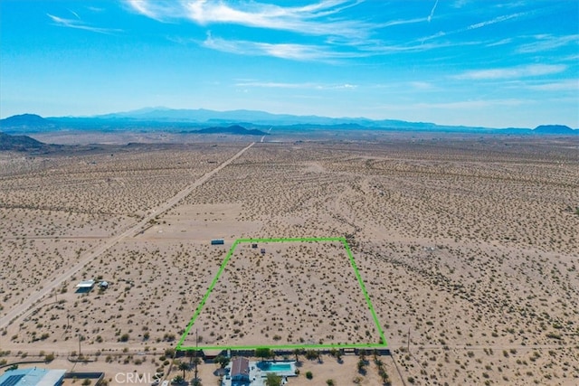 aerial view with a rural view, a desert view, and a mountain view