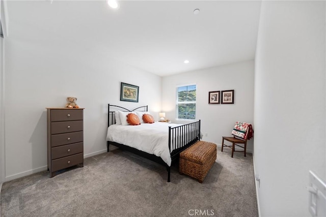bedroom featuring recessed lighting, baseboards, and carpet