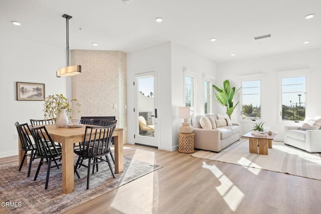 dining space featuring recessed lighting, baseboards, visible vents, and light wood-type flooring