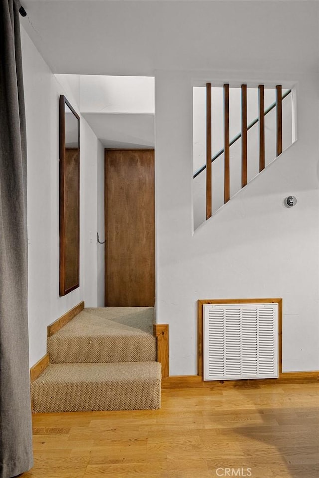 29387 Lake View Dr, Cedar Glen, CA 92321 - stairs with wood finished floors and baseboards