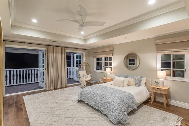 1232 Blue Gum Ln, Newport Beach, CA 92660 - bedroom featuring a tray ceiling, access to exterior, baseboards, ornamental molding, and wood finished floors