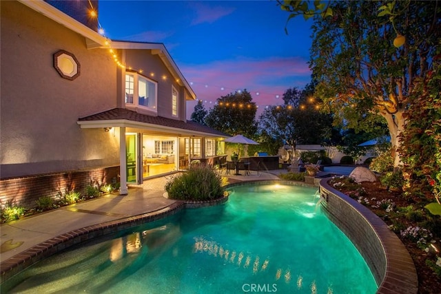 1232 Blue Gum Ln, Newport Beach, CA 92660 - pool at dusk with an outdoor pool and a patio