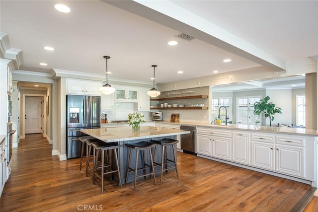 1232 Blue Gum Ln, Newport Beach, CA 92660 - kitchen with white cabinetry, open shelves, a sink, appliances with stainless steel finishes, and ornamental molding