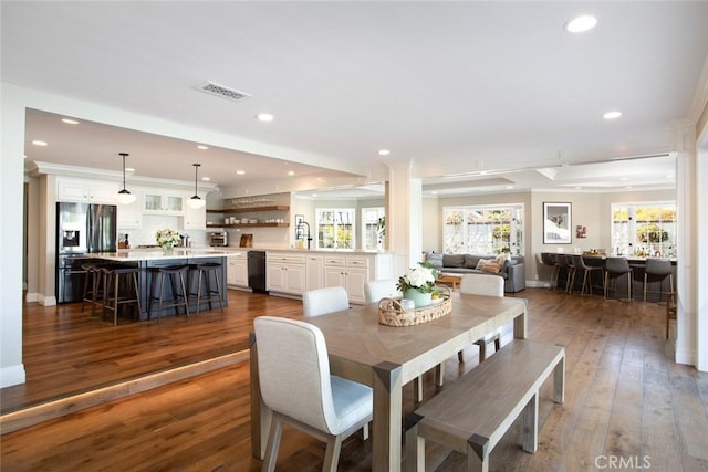 1232 Blue Gum Ln, Newport Beach, CA 92660 - dining room featuring recessed lighting, dark wood-type flooring, visible vents, baseboards, and ornamental molding