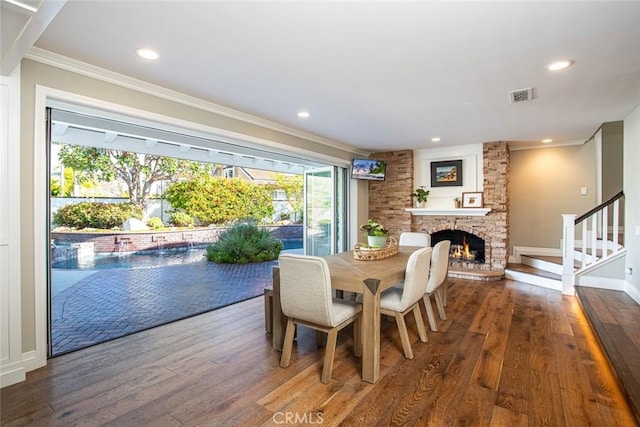 1232 Blue Gum Ln, Newport Beach, CA 92660 - dining area featuring ornamental molding, recessed lighting, stairs, and wood finished floors