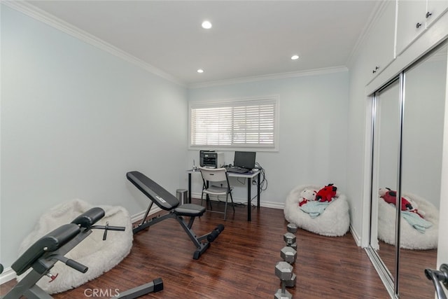 exercise room with recessed lighting, baseboards, ornamental molding, and wood finished floors