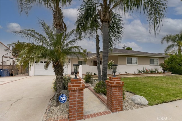 view of front of property featuring an attached garage, a front lawn, stucco siding, and concrete driveway