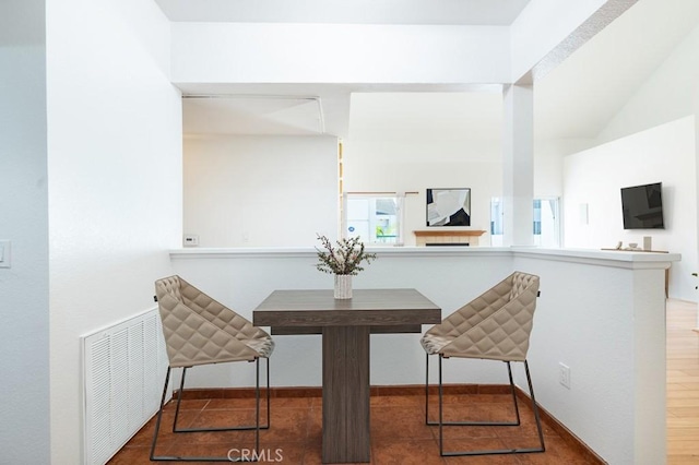 dining space featuring visible vents