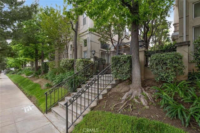 view of home's exterior with stairs