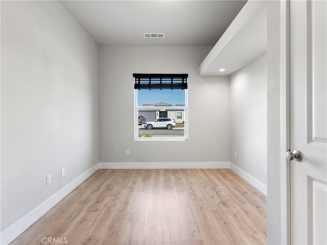 5211 Wingspan Ln, Bakersfield, CA 93306 - unfurnished room featuring baseboards, visible vents, and wood finished floors