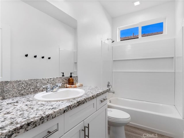 5211 Wingspan Ln, Bakersfield, CA 93306 - full bath featuring toilet, wood finished floors, bathtub / shower combination, and vanity
