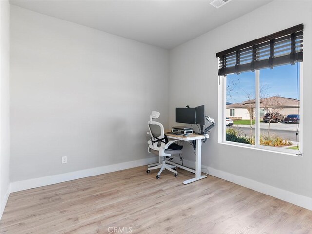5211 Wingspan Ln, Bakersfield, CA 93306 - office with baseboards and wood finished floors