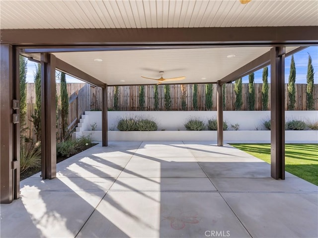 5211 Wingspan Ln, Bakersfield, CA 93306 - view of patio with fence and a ceiling fan