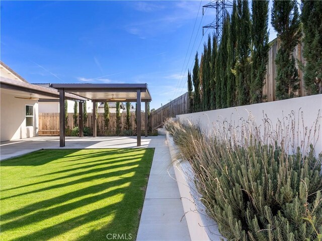 5211 Wingspan Ln, Bakersfield, CA 93306 - view of yard with a patio and a fenced backyard