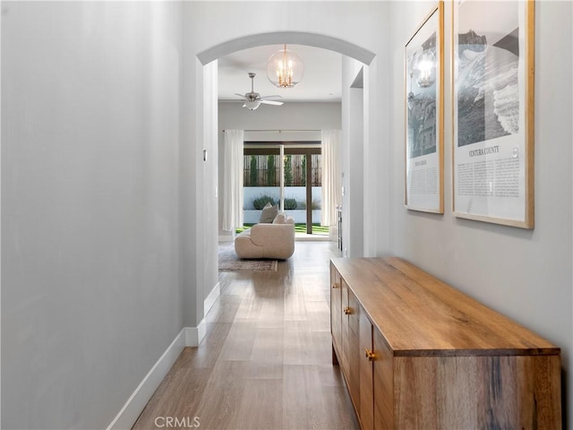 5211 Wingspan Ln, Bakersfield, CA 93306 - hallway with wood finished floors and arched walkways